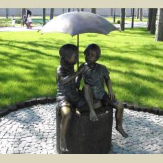 Kids Under Umbrella Stone